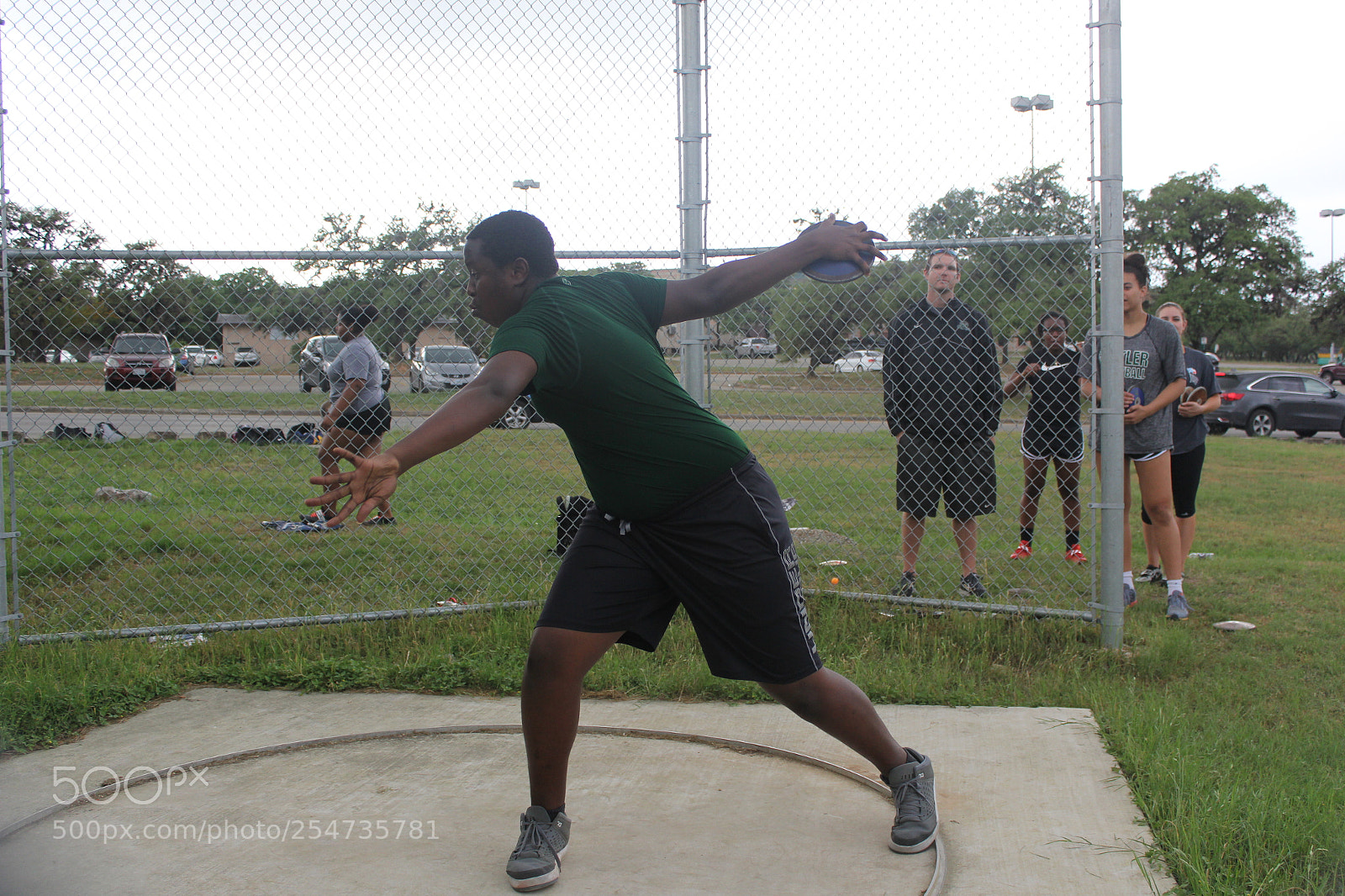 Canon EOS 60D sample photo. Ronald reagan varsity discus photography