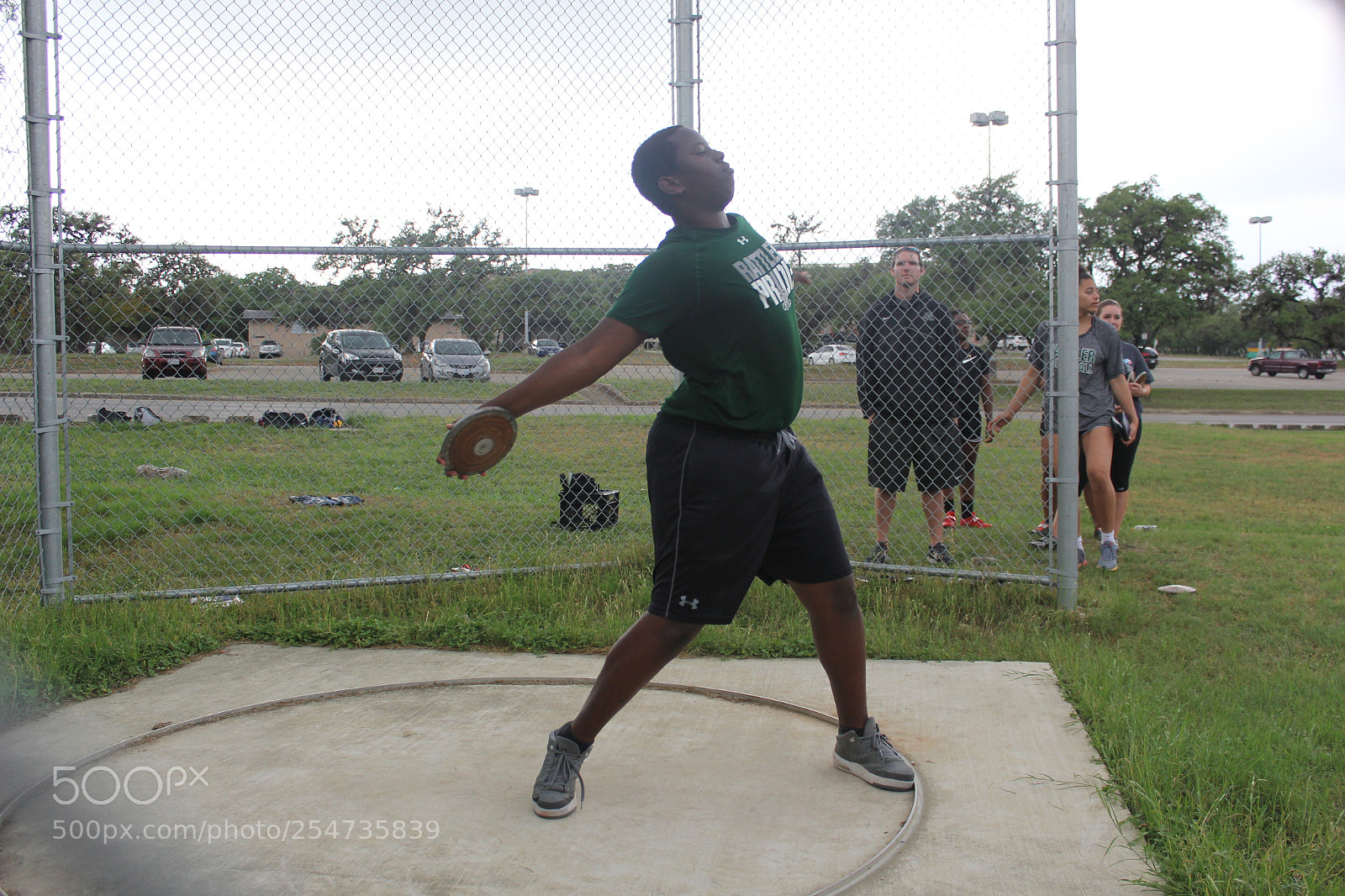 Canon EOS 60D sample photo. Ronald reagan varsity discus photography