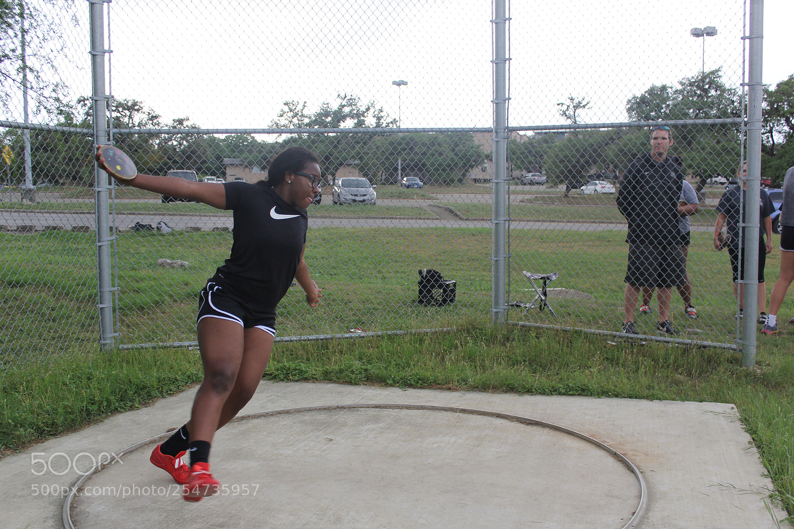 Canon EOS 60D sample photo. Ronald reagan varsity discus photography