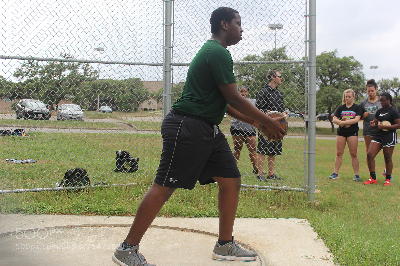 Canon EOS 60D sample photo. Ronald reagan varsity discus photography