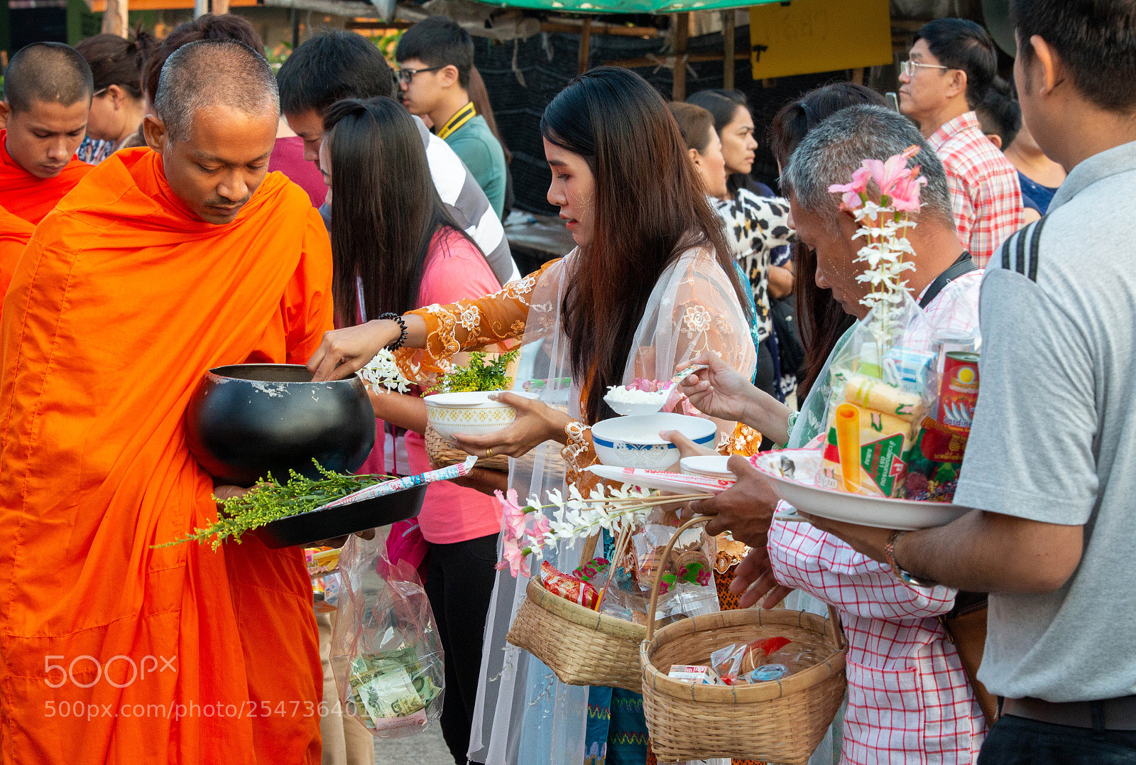 Canon EOS 70D sample photo. Unidentified woman is giving photography