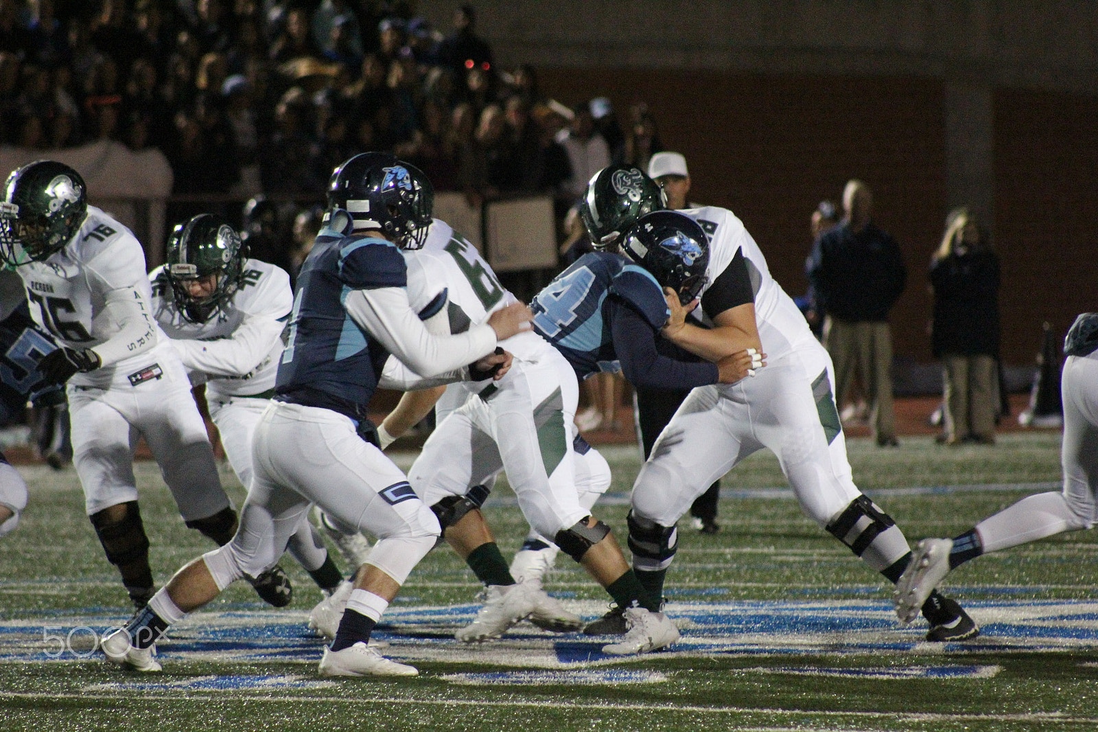 Canon EF 75-300mm f/4-5.6 USM sample photo. Varsity ronald reagan football photography