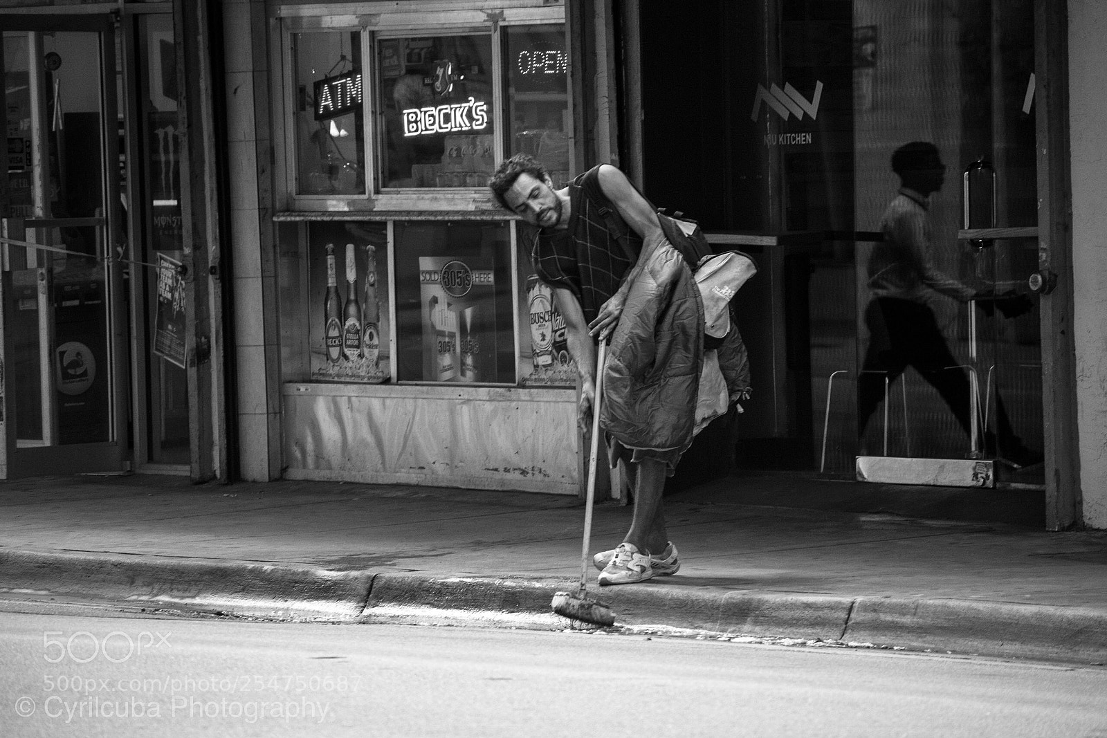 Nikon D5500 sample photo. Homeless man cleaning the photography