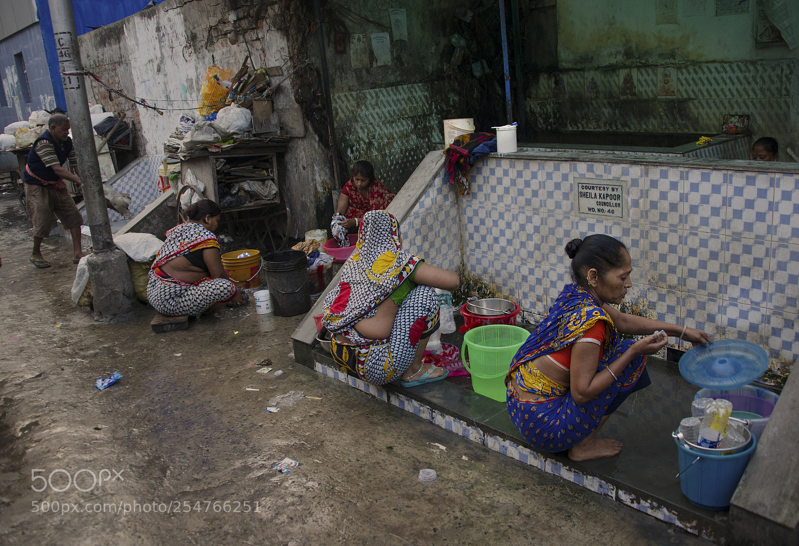 Nikon D800E sample photo. Washing clothes on streets photography