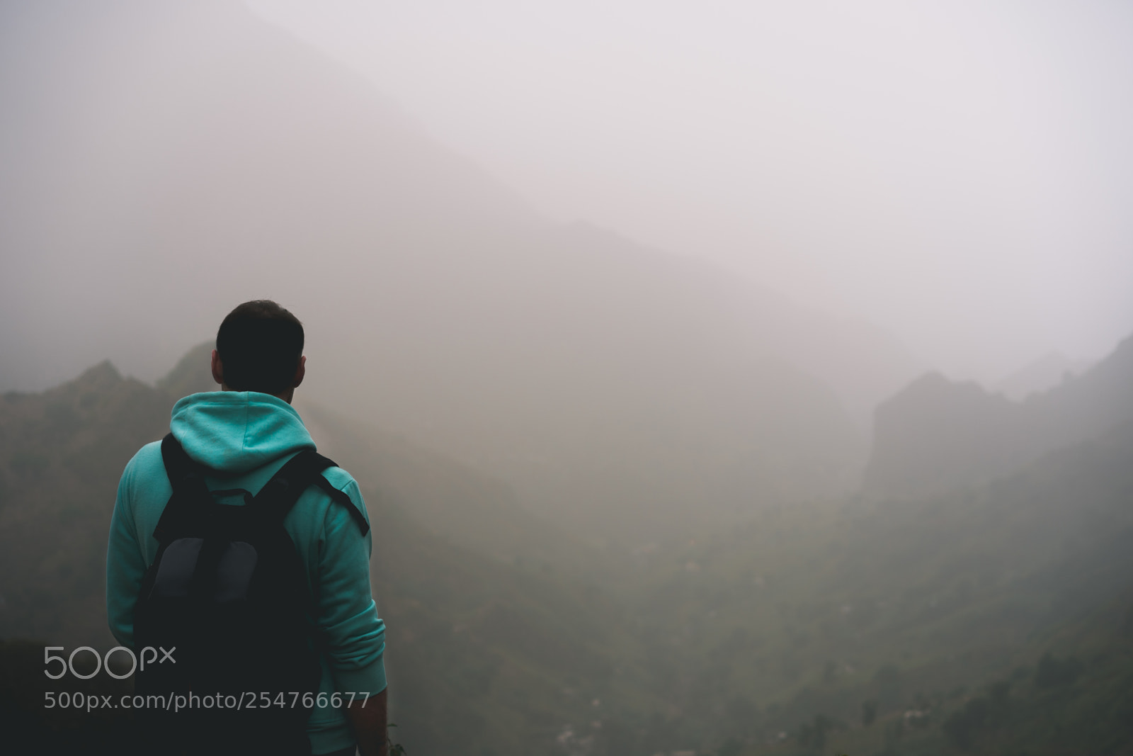 Sony a7 II sample photo. Traveler in hoodie in photography