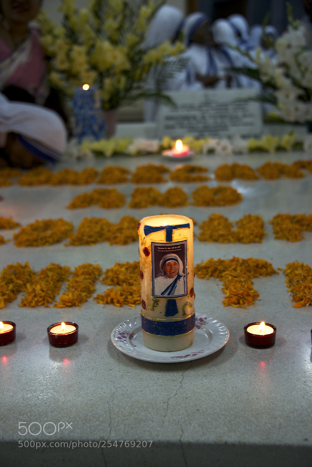 Nikon D800E sample photo. Candle burns on tomb photography