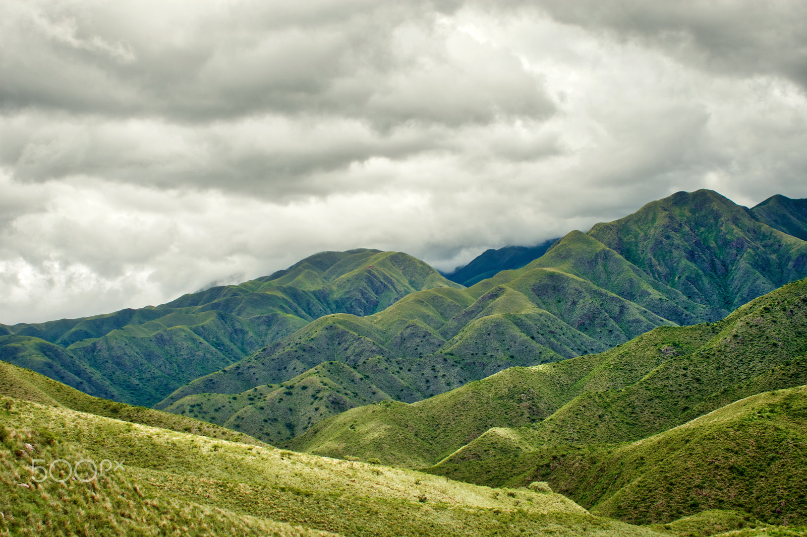 AF Zoom-Nikkor 35-135mm f/3.5-4.5 N sample photo. Mountainous silhouettes with stormy sky photography