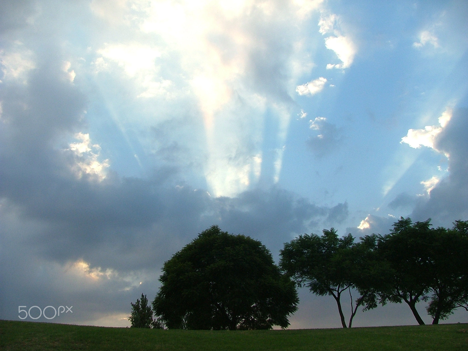 Fujifilm FinePix S5000 sample photo. African sunset through dramatic clouds photography