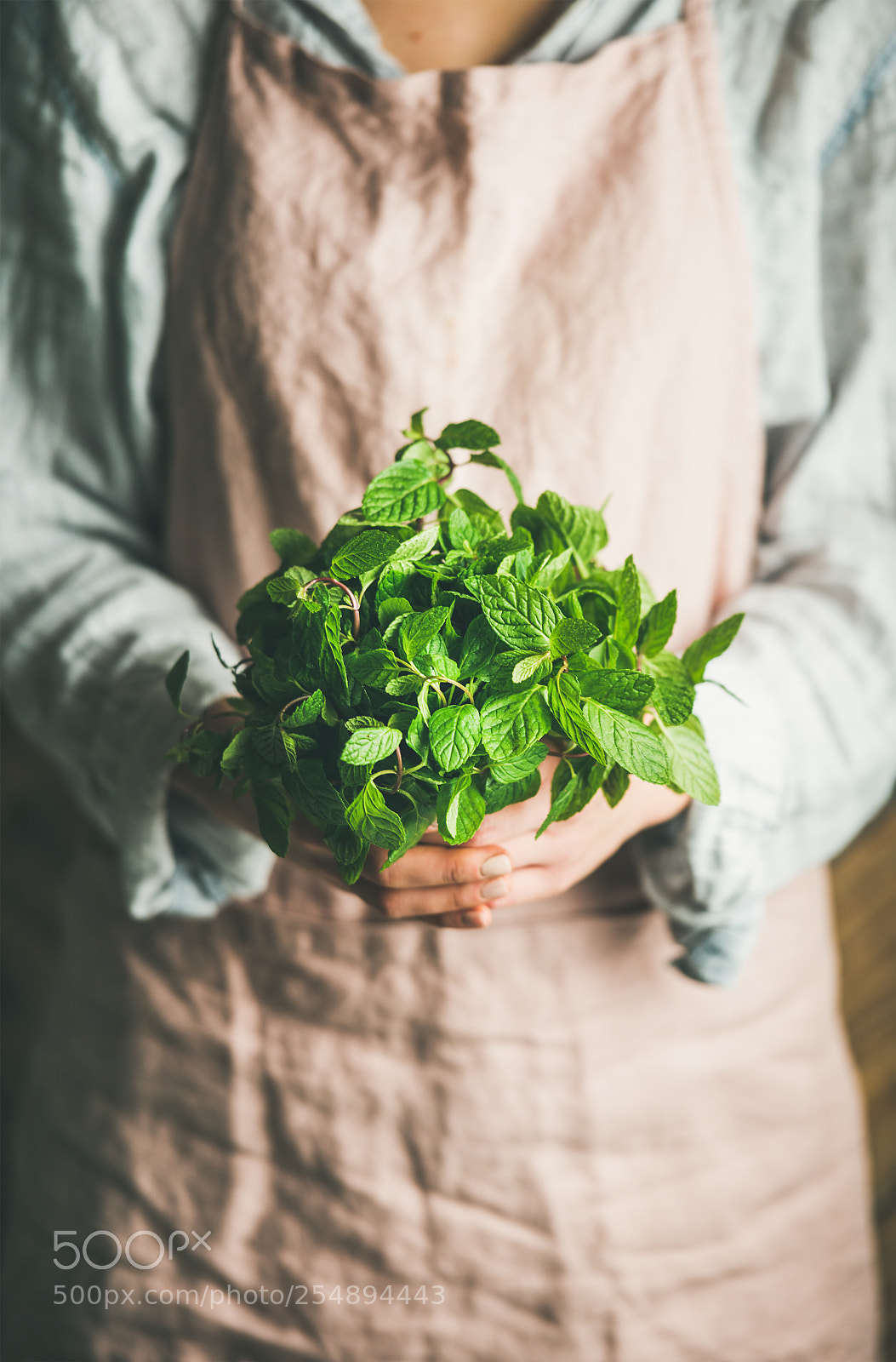 Nikon D610 sample photo. Female farmer holding bunch photography