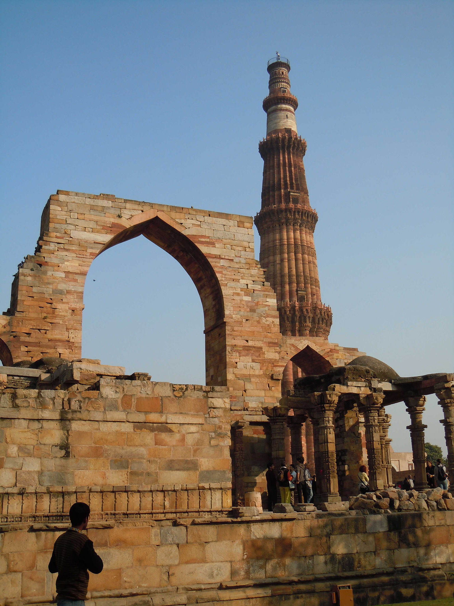 Nikon Coolpix S8000 sample photo. View of qutub minar from quwwat ul islam mosque photography