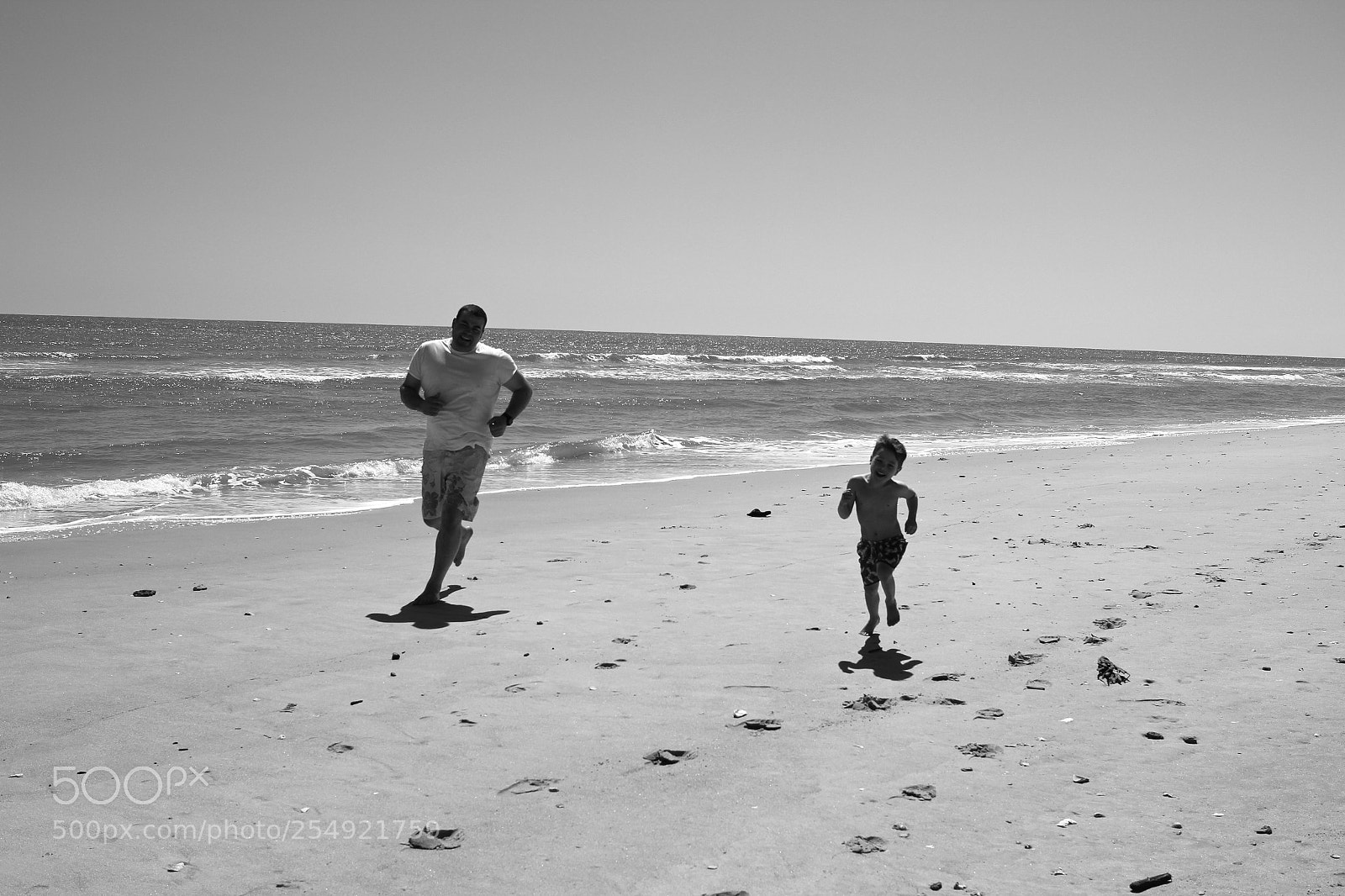 Canon EOS 600D (Rebel EOS T3i / EOS Kiss X5) sample photo. Father son run photography