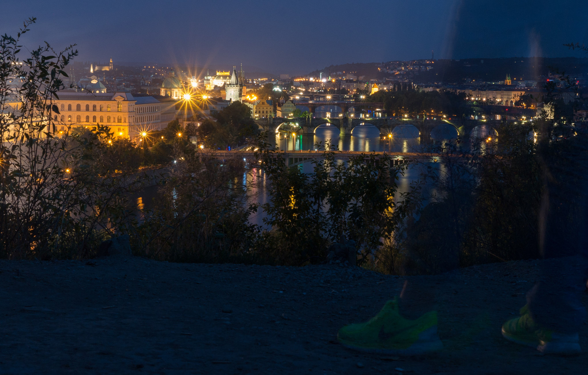 Sony Alpha NEX-5T sample photo. Watching over prague with the ghost in nikes photography