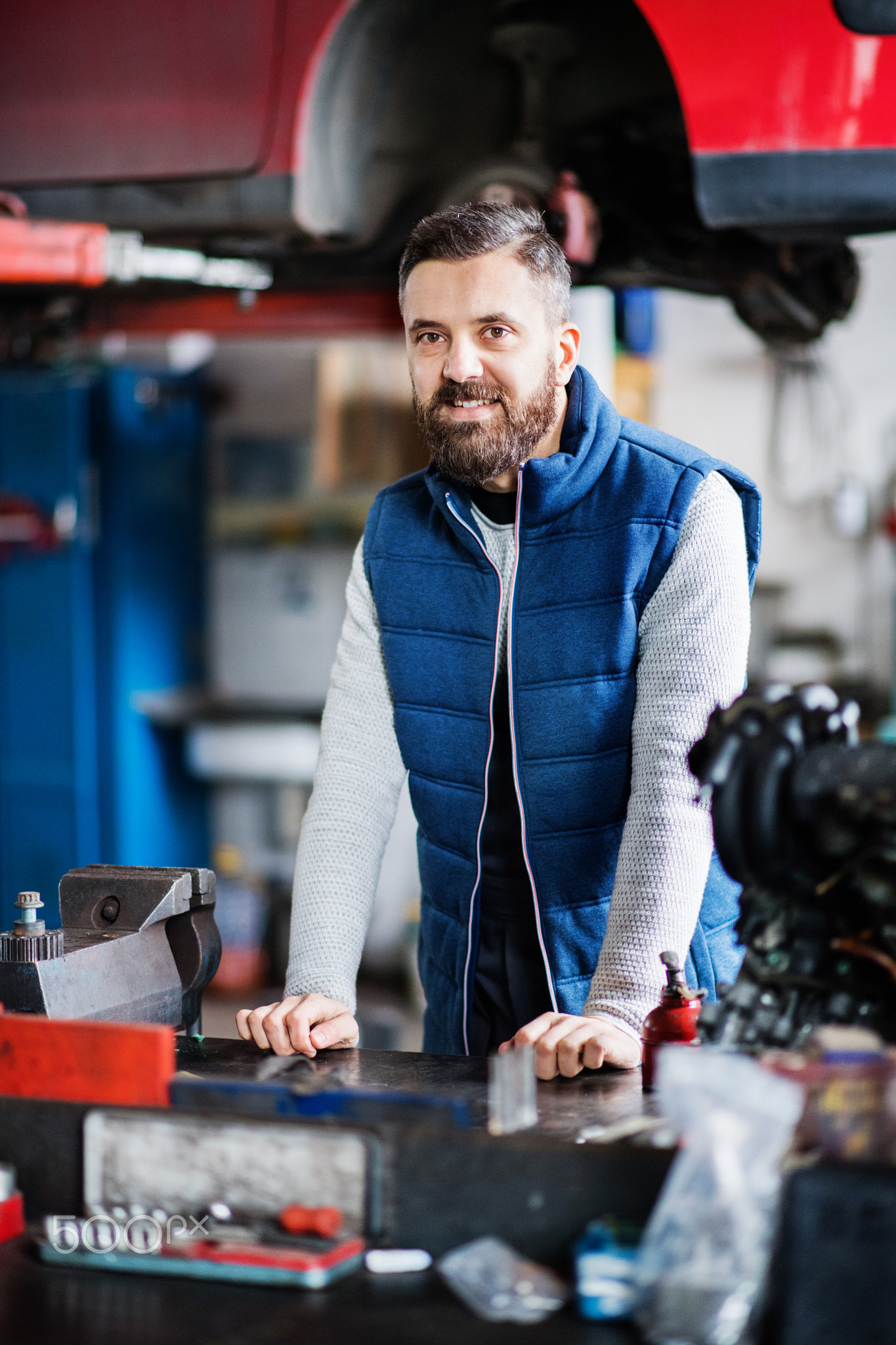 Man mechanic in a car garage.