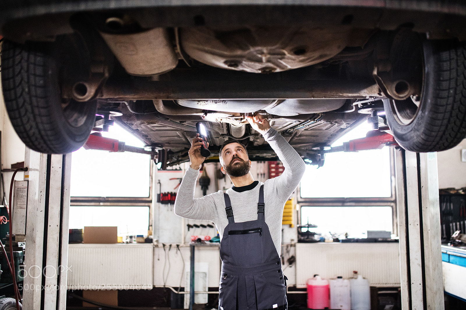 Nikon D5 sample photo. Man mechanic repairing a photography