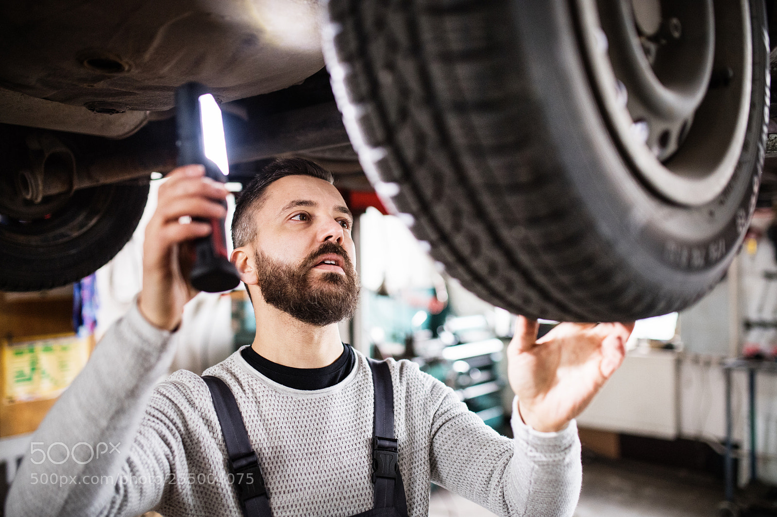 Nikon D5 sample photo. Man mechanic repairing a photography