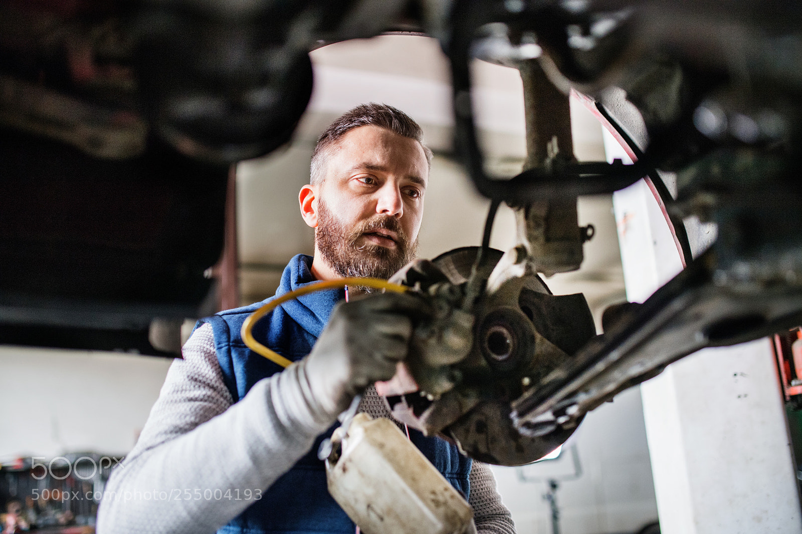 Nikon D5 sample photo. Man mechanic repairing a photography