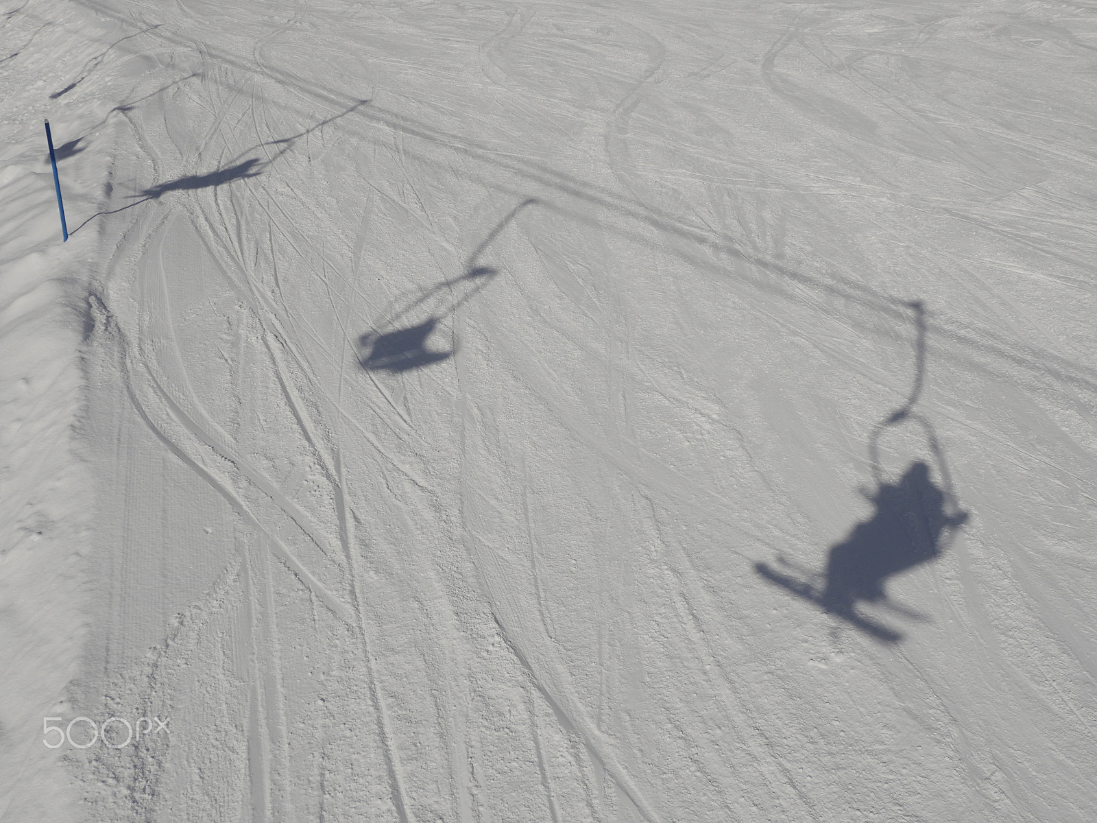 Panasonic Lumix DMC-GH4 sample photo. Shadow of chair lift photography