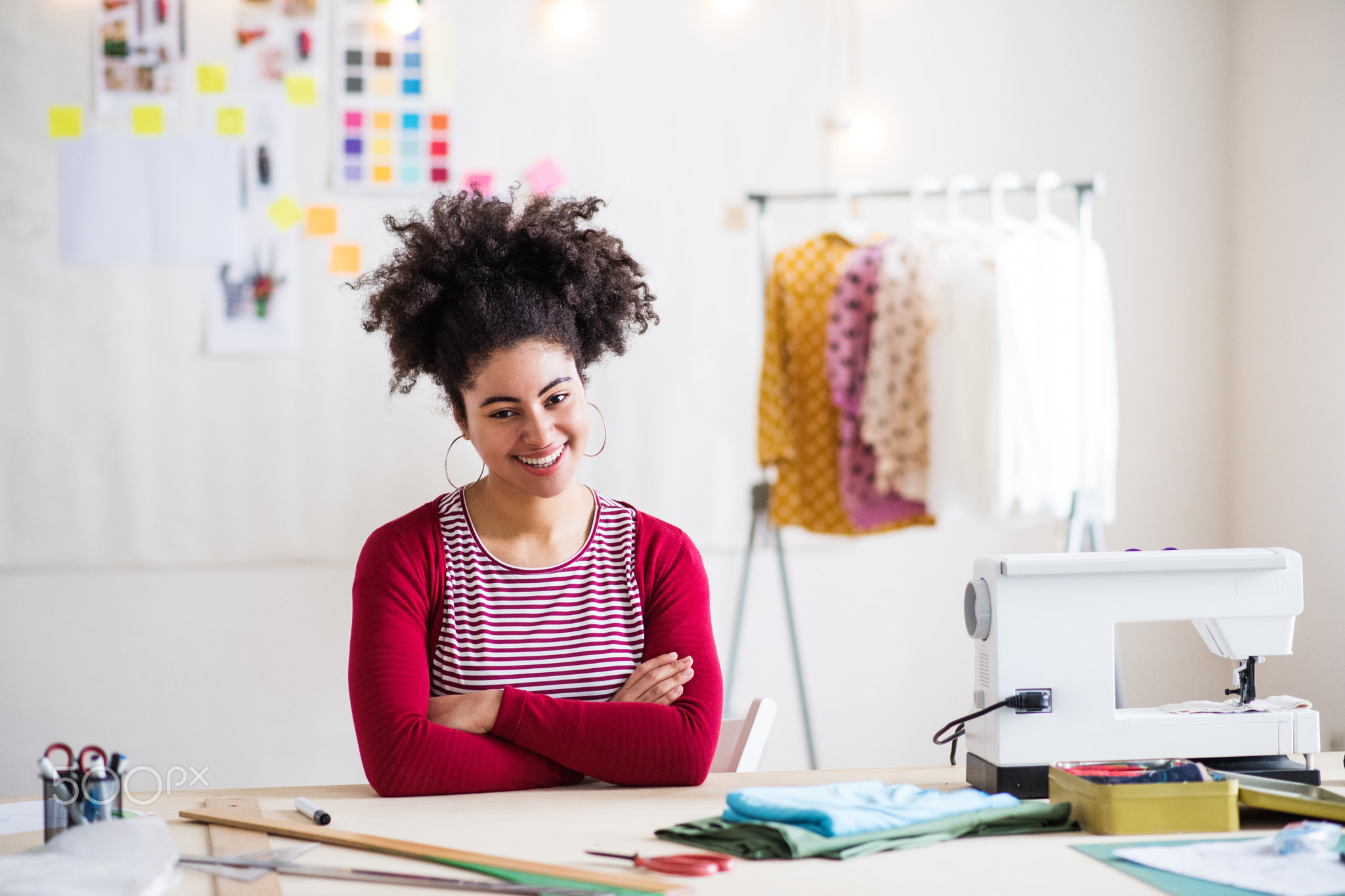 Young creative woman in a studio, startup business.