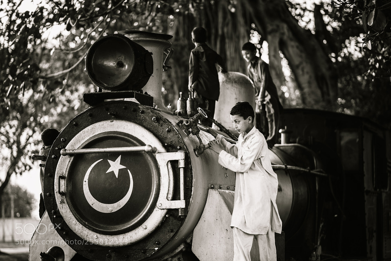 Nikon D610 sample photo. Children playing atop train photography