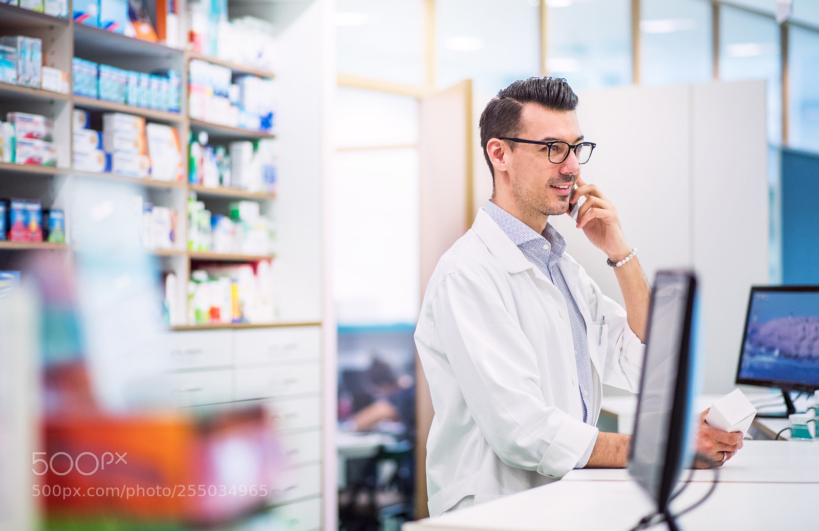 Nikon D5 sample photo. Young friendly male pharmacist photography