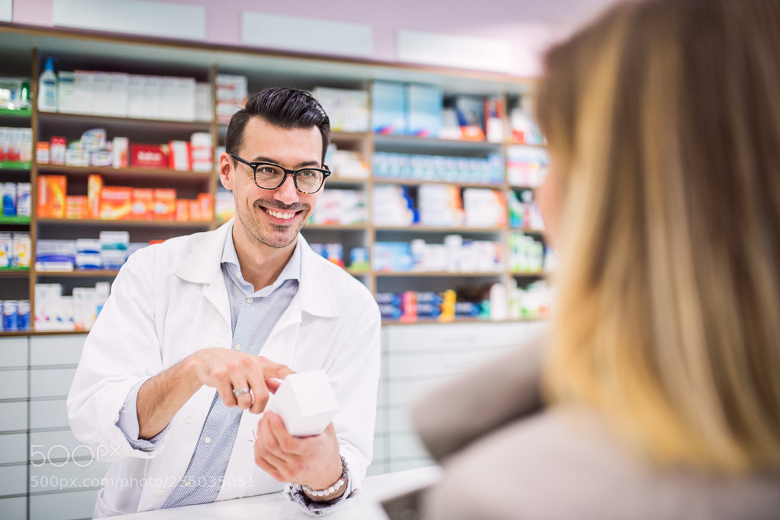 Nikon D5 sample photo. Male pharmacist serving a photography