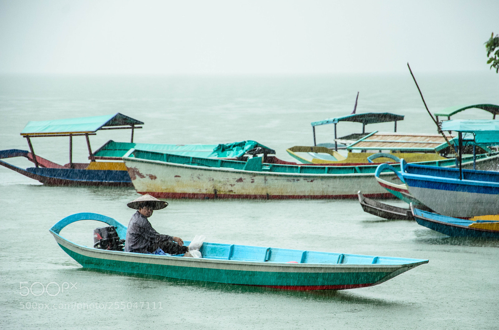 Nikon D7000 sample photo. Boating in the rain photography