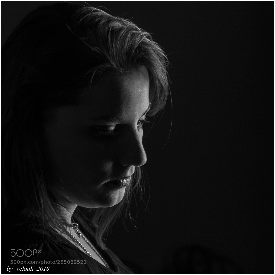 Pentax K-5 sample photo. Claudia in low light photography