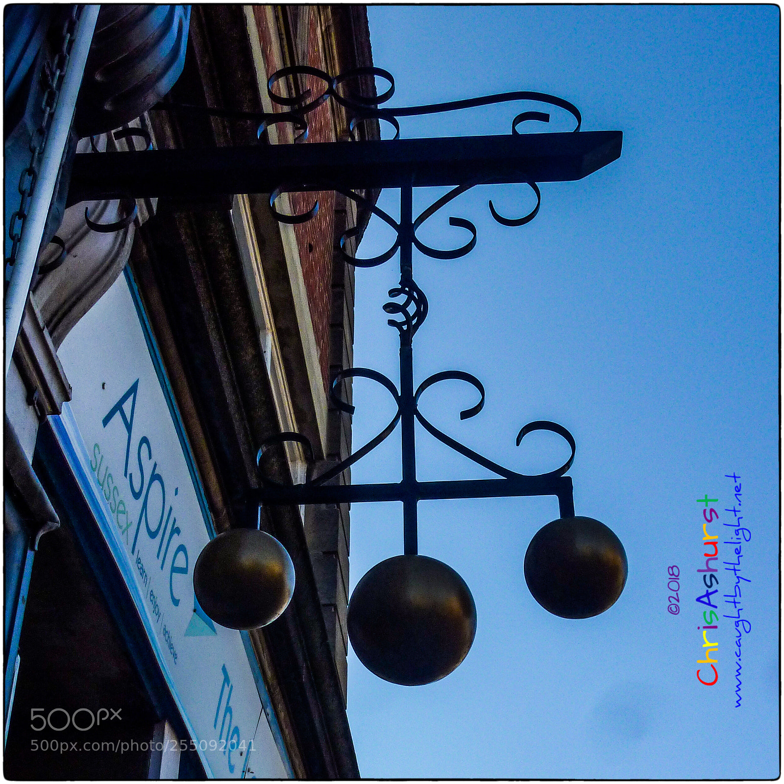 Panasonic DMC-TZ7 sample photo. Traditional pawnbroker sign photography