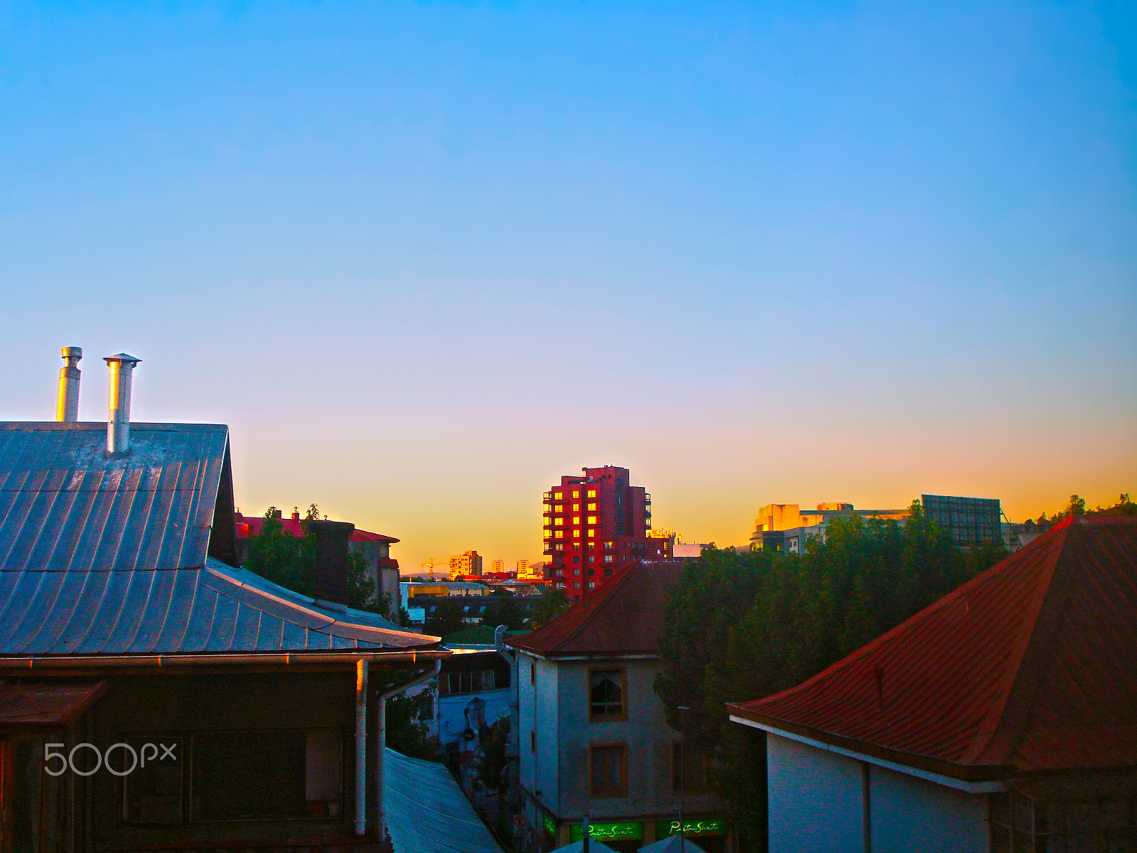 Sony DSC-W55 sample photo. Rooftops. photography