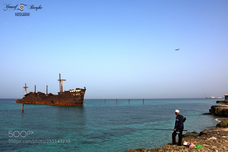 Nikon D7200 sample photo. Greek ship and fisherman photography