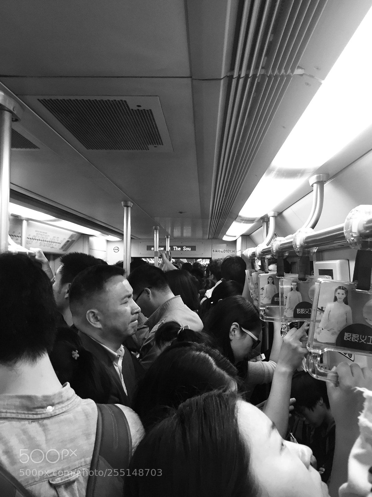 Apple iPhone 6 Plus sample photo. In the metro photography