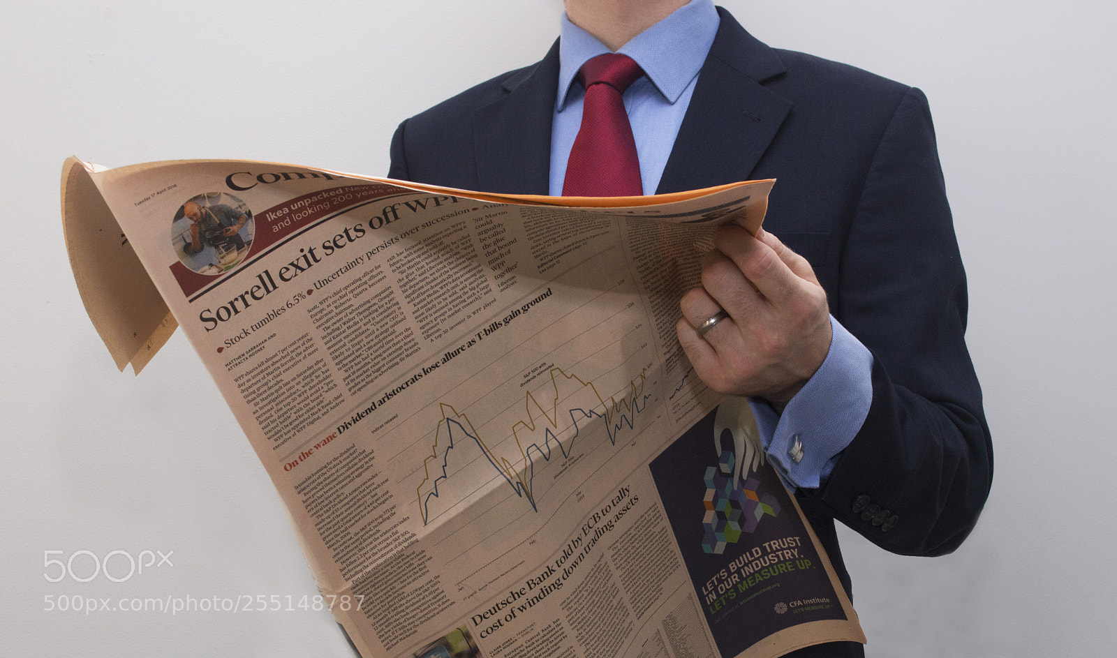 Nikon D3200 sample photo. Businessman reading financial newspaper photography