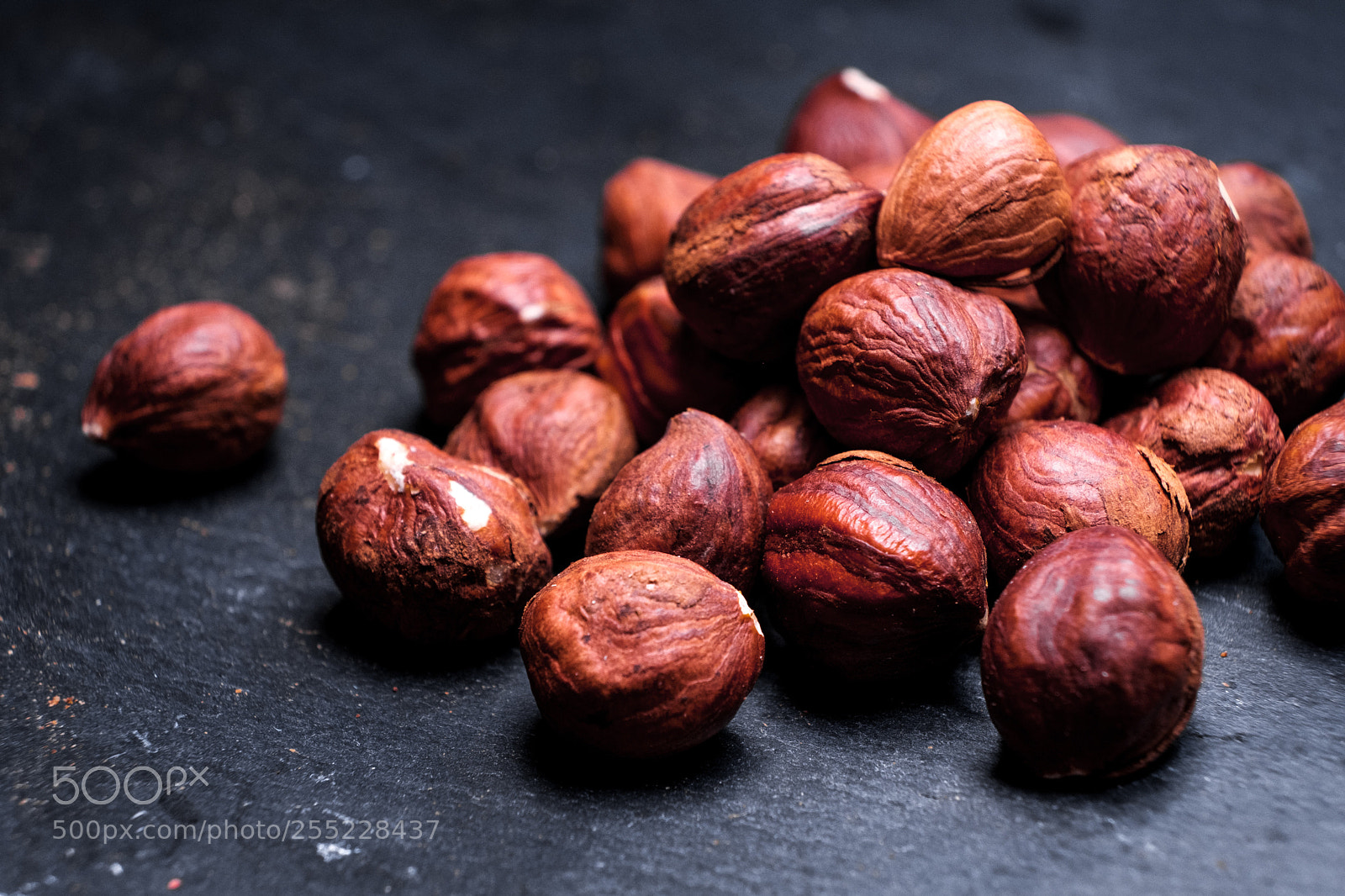 Fujifilm X-T2 sample photo. Hazelnuts on a black photography