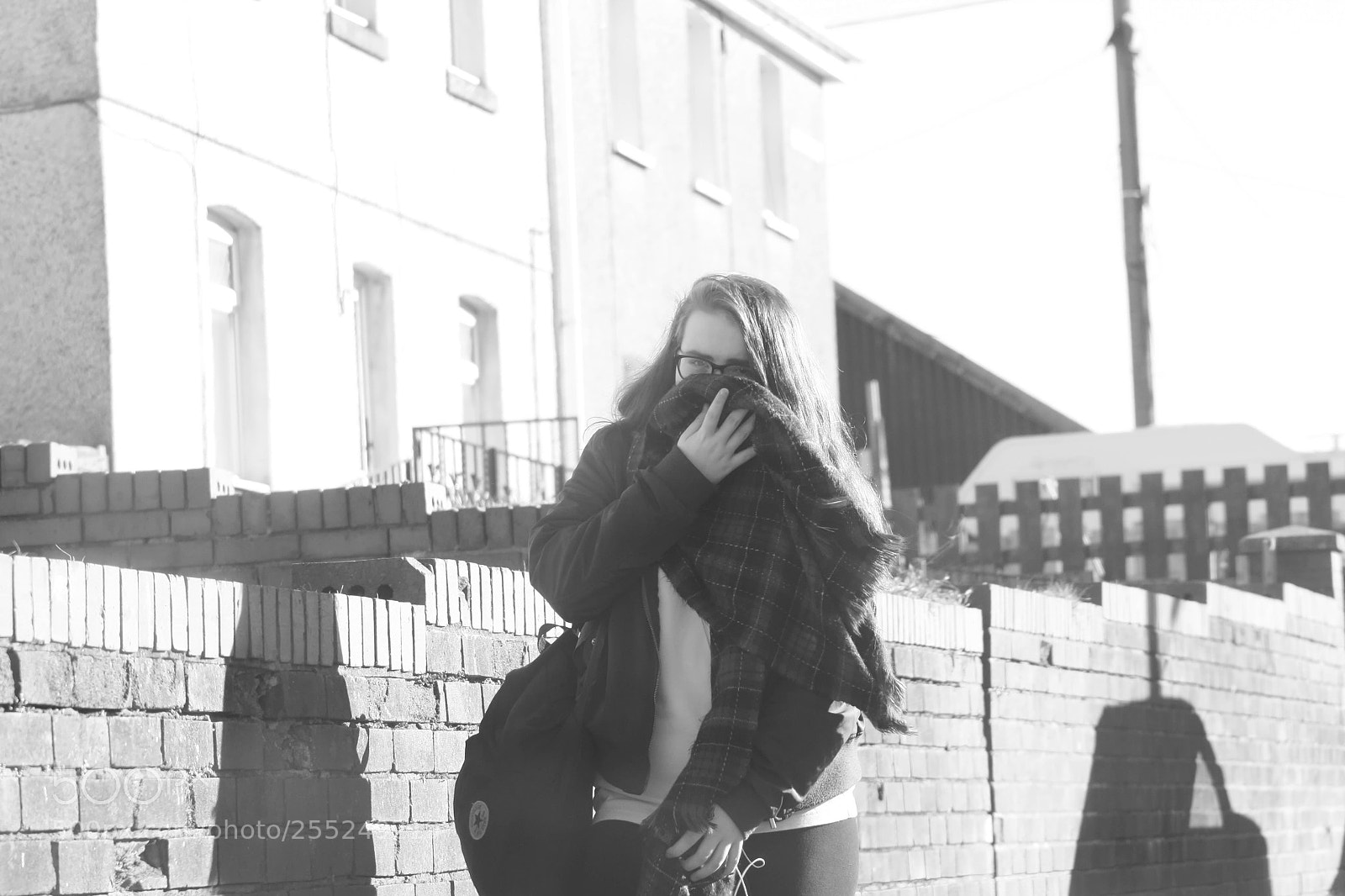 Canon EOS 450D (EOS Rebel XSi / EOS Kiss X2) sample photo. Teenage girl outside hiding photography