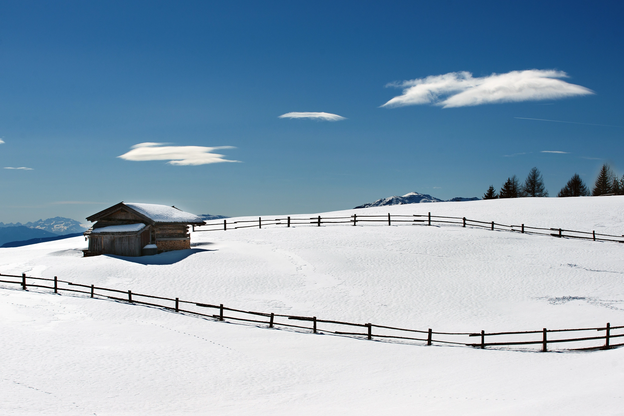 Sony Alpha DSLR-A900 sample photo. Fence, hut and clouds photography