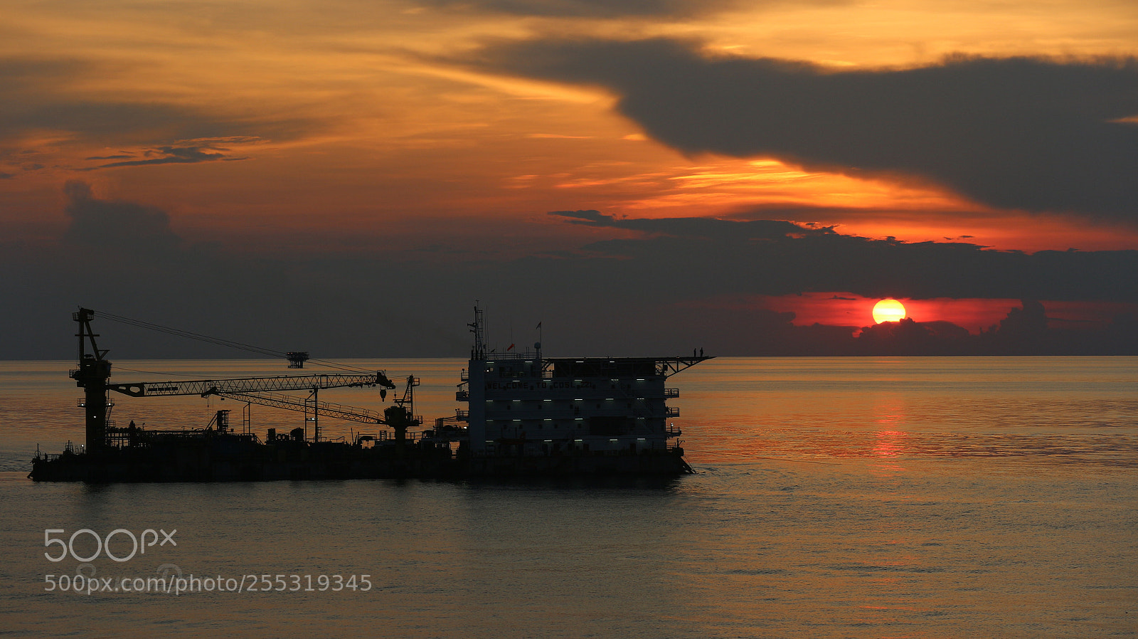Canon EOS M10 sample photo. Barge & sun photography