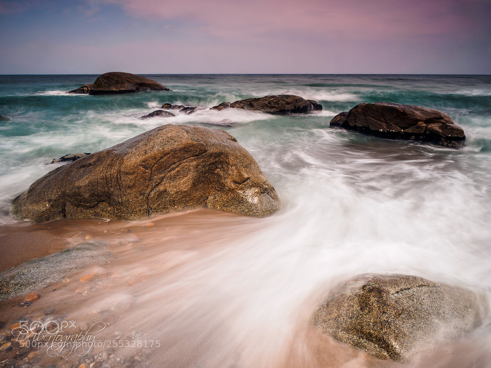 Olympus OM-D E-M1 sample photo. Rocks in a tide photography