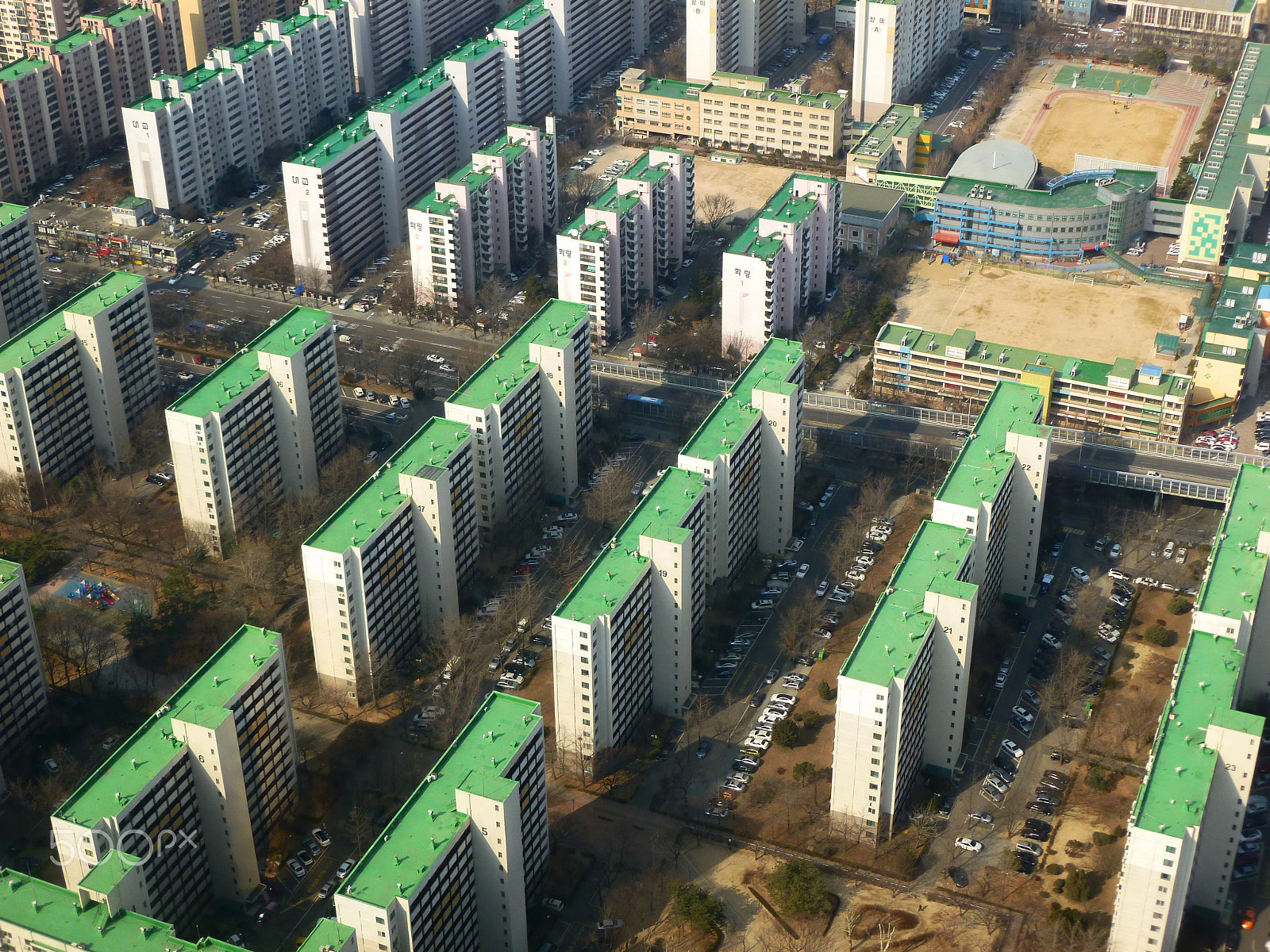 Panasonic DMC-FH25 sample photo. Aerial view of apartment buildings rows photography