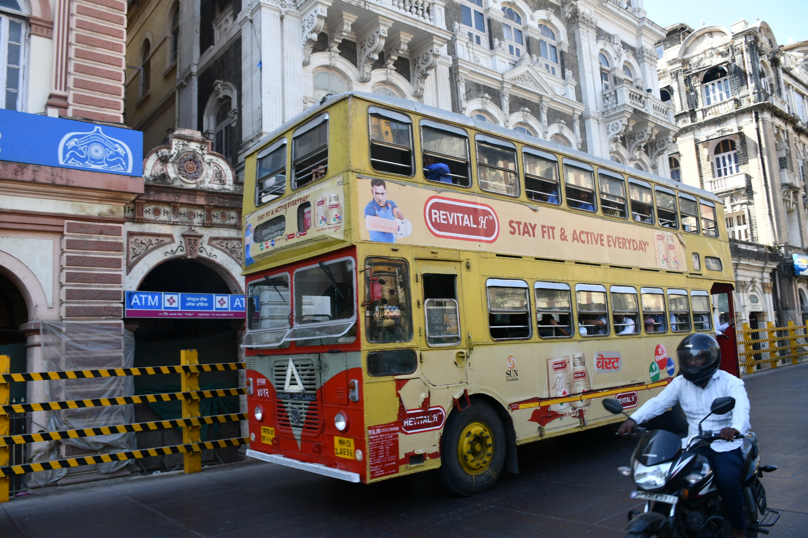 Nikon D7500 + Nikon AF-S DX Nikkor 18-140mm F3.5-5.6G ED VR sample photo. A colourful double decker in mumbai photography