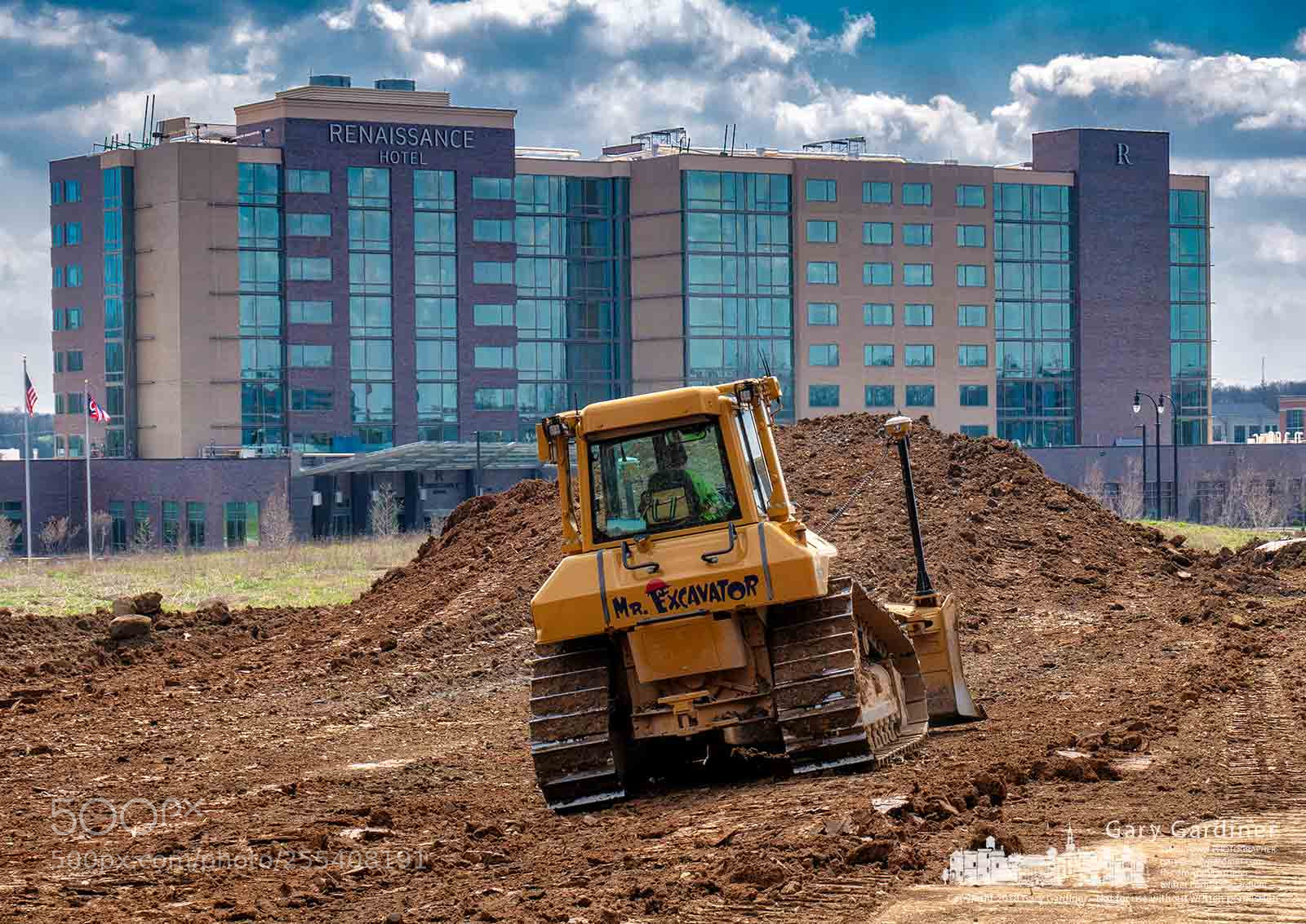 Panasonic Lumix DMC-G85 (Lumix DMC-G80) sample photo. Office building dirt pile photography