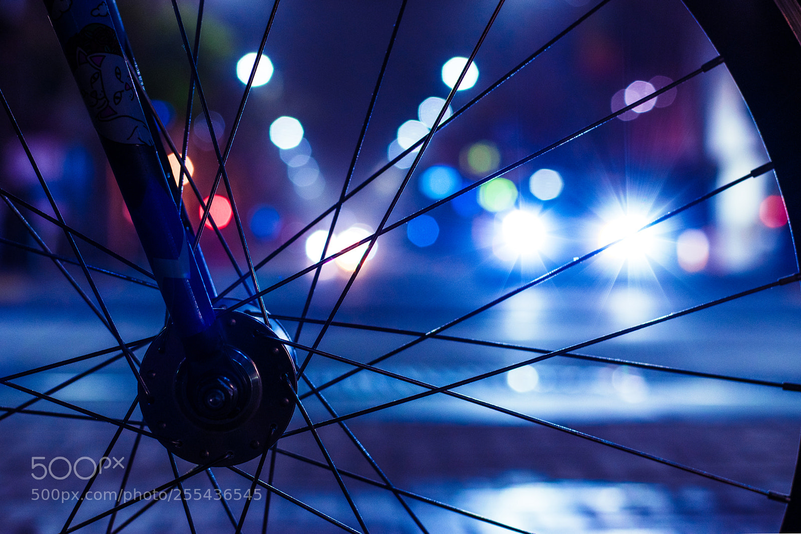 Nikon D5300 sample photo. Lights through bike wheel photography