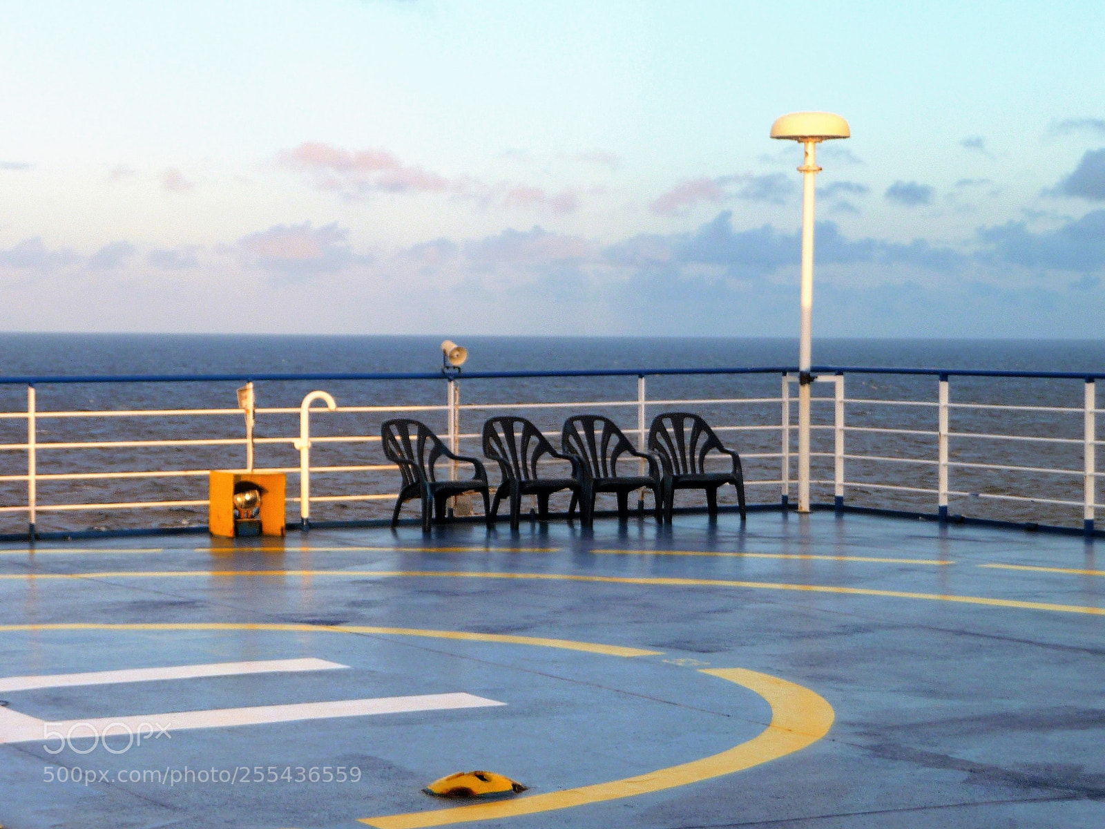 Panasonic Lumix DMC-TZ5 sample photo. Four black chairs photography