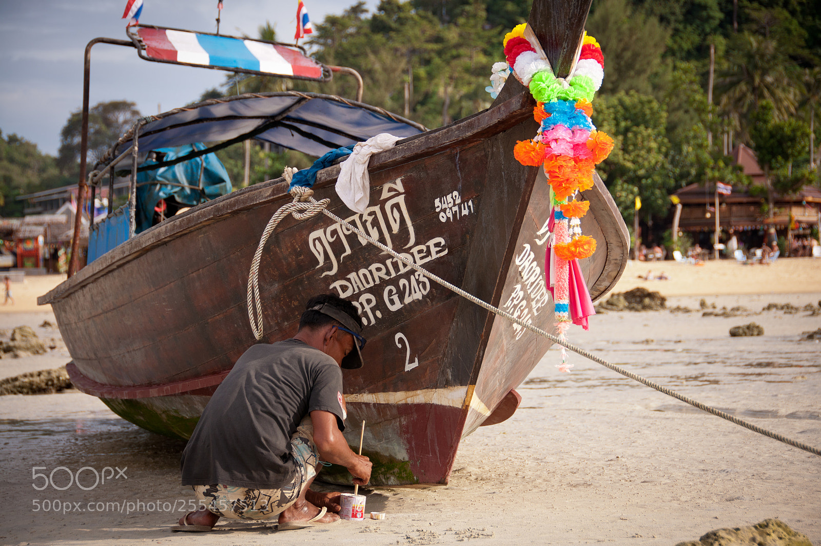 Nikon D90 sample photo. Re-painting the boat name photography