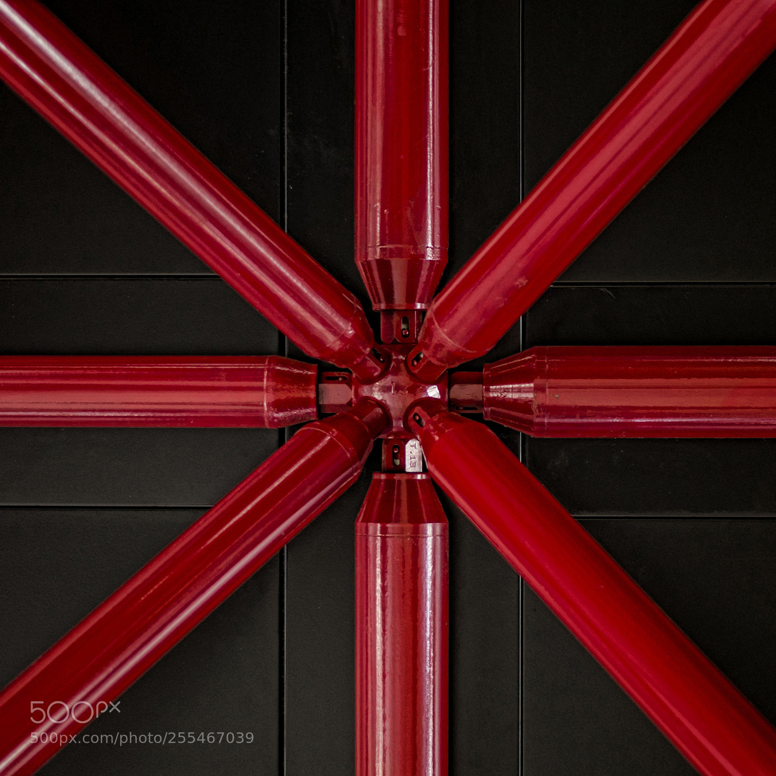 Nikon D7000 sample photo. Metallic red bars symmetry photography