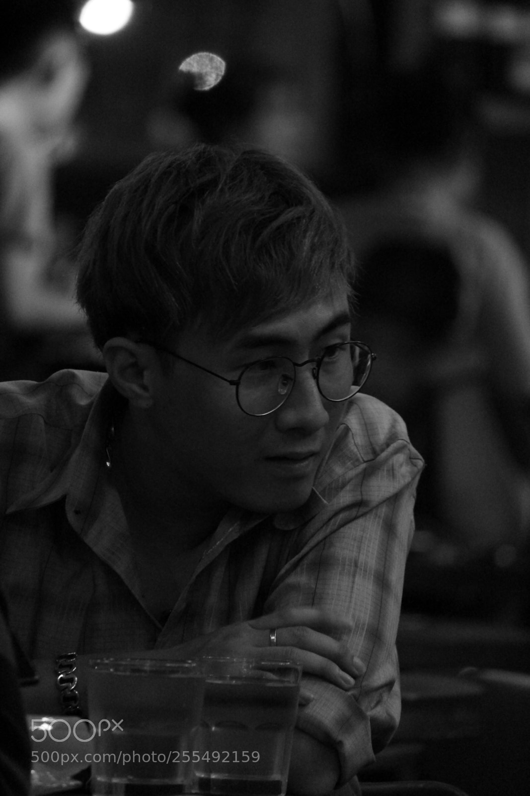 Canon EF-S 55-250mm F4-5.6 IS II sample photo. Someone at a coffee photography