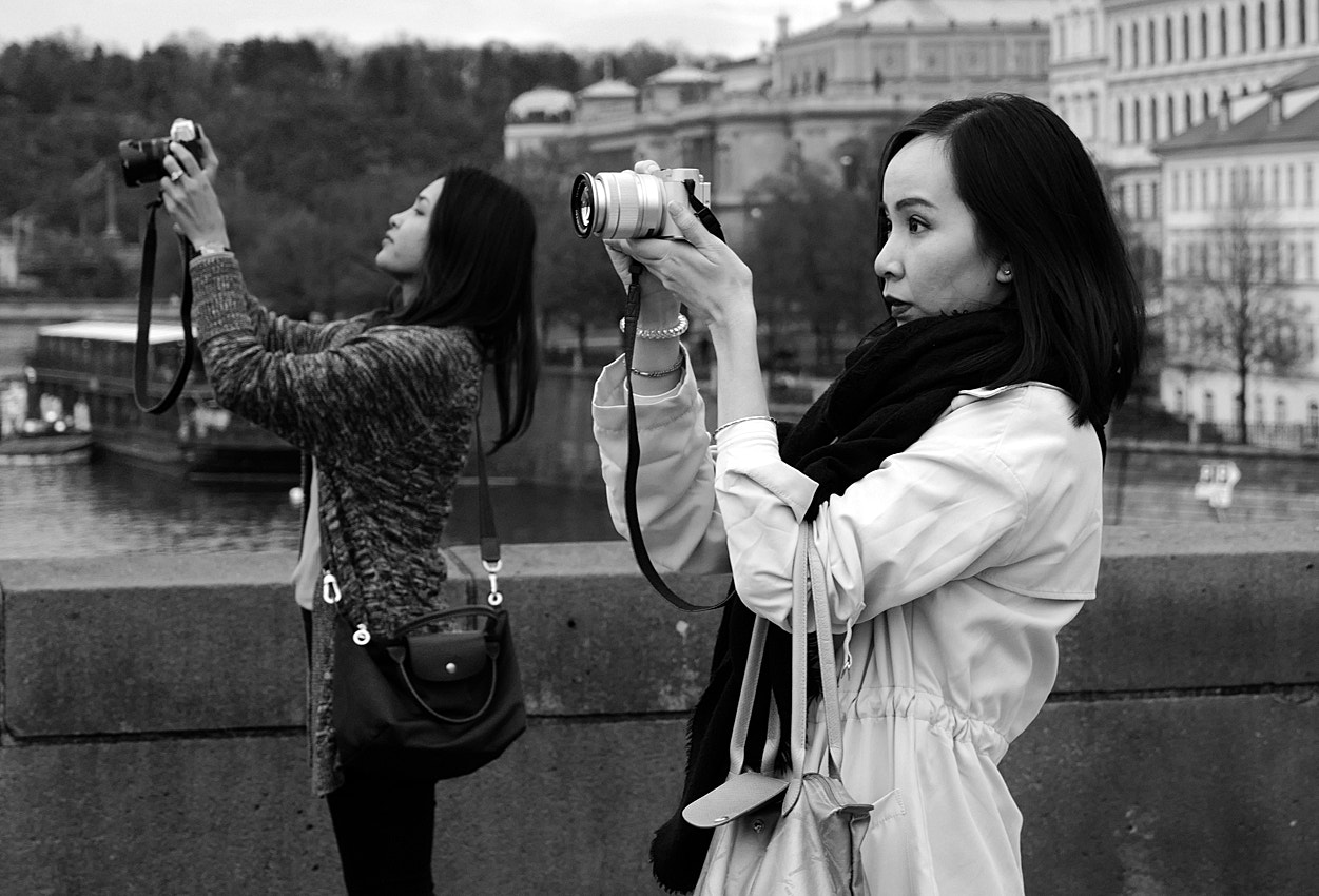 Leica CL sample photo. What do they see? photography