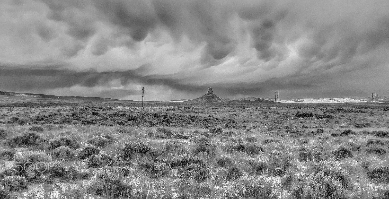Apple iPad sample photo. Mammatus form over boars tusk photography