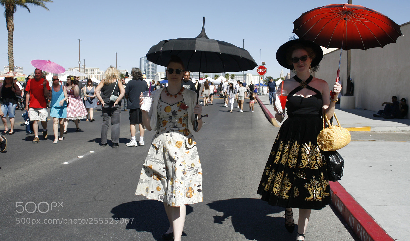 Canon EOS 30D sample photo. Two parasol holding ladies photography