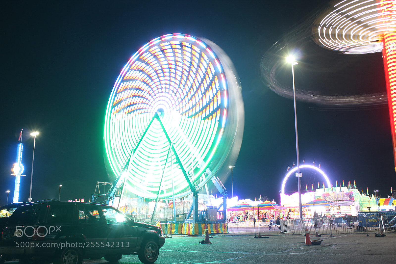 Canon EOS 1200D (EOS Rebel T5 / EOS Kiss X70 / EOS Hi) sample photo. Ferris wheel in motion photography