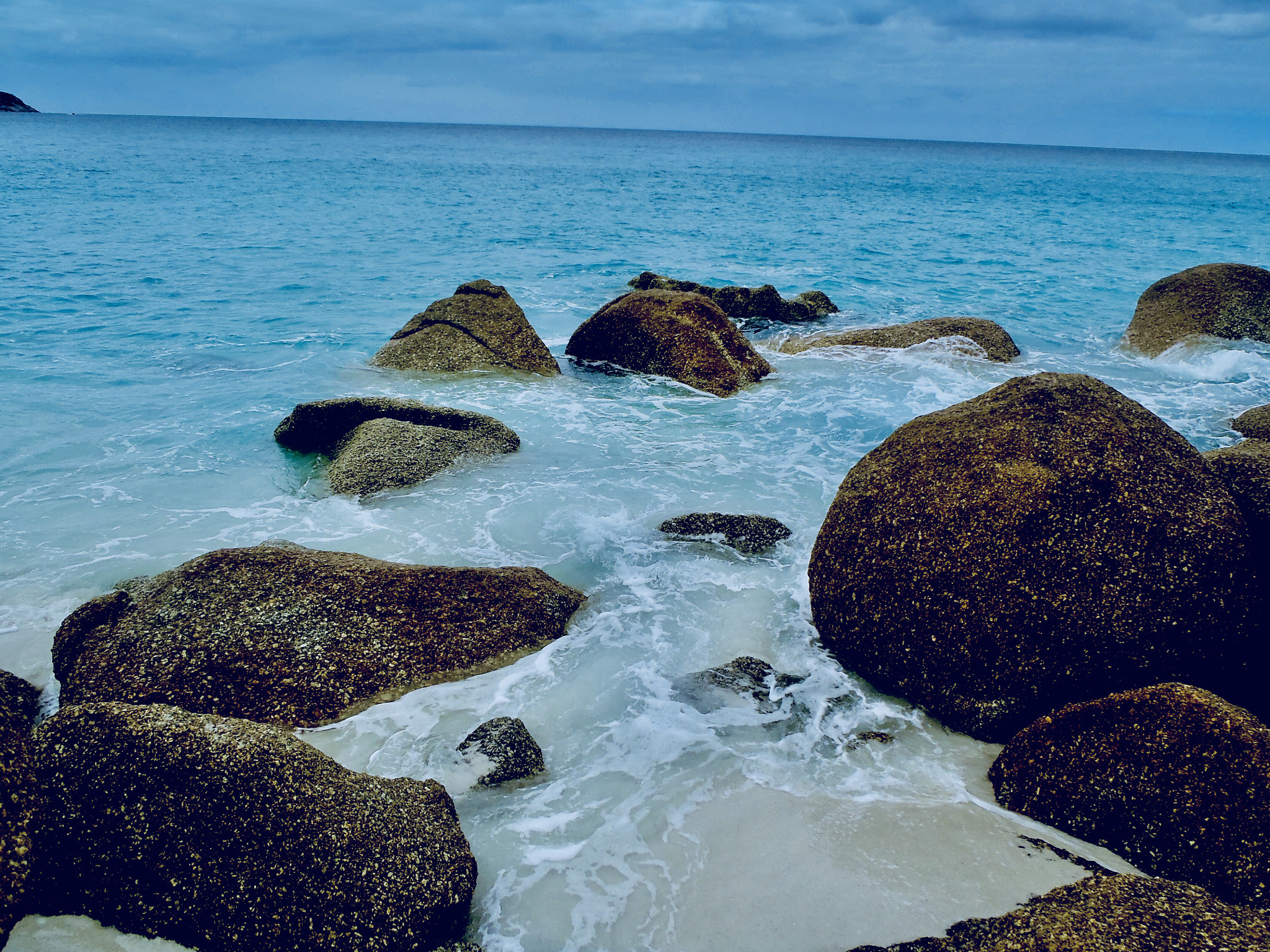 Olympus TG-810 sample photo. Rocks in the ocean photography